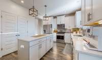 Kitchen View, SS Appliances and Big Pantry