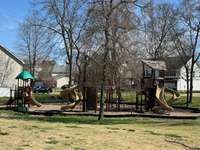 Playground area just a few houses away!  Next to the picnic pavilion space for spending time outside.