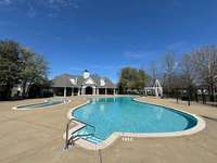 Look how inviting this is.  There is large pool and a baby pool with plenty of seating during the pool season, two large umbrellas for shade.