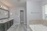 Alternate view of this bathroom, easily accommodates more than one person getting ready at the same time.