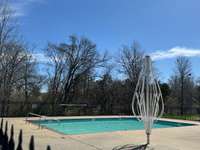 Secondary pool located on the other side of the community.  Homeowners are welcome to use either pool.  This one also has a main pool as well as a baby pool and umbrellas for shade.