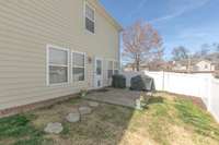 Alternate view of the patio area and fenced in yard