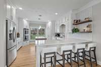 This Kitchen has it all! All the counterspace you've been needing, storage galor and high-end finishes.