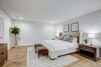Dreamy master suite with glistening hardwoods