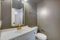 Full bath with style. Designer tile selections throughout. Spacious shower/tub in secondary bedroom