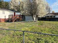 Great back yard with fence.