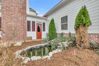 A small pond area delicately separates the enclosed porch from the pool and deck area, adding a touch of tranquility and beauty! 2491 Taylor Ln  Eagleville, TN 37060