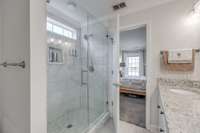 Large walk-in shower in owner's suite bathroom.