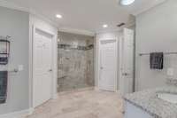 Upstairs bathroom has been updated with beautiful travertine floors and shower. The walk-in closet is massive and wraps around the entire bathroom.