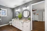 Lovely full bathrooms with double vanities