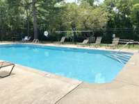 Neighborhood pool is only a few years old and owner says is never crowded!  Well-maintained and at the more private side of the complex.