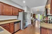 Nice Cherry cabinets in this kitchen with Stainless Steel appliances. The Refrigerator will remain with the property.
