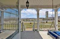 The covered porch of the house offers an stunning view stretching in all directions!1833 Porterfield Rd Readyville, TN 37149