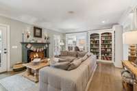 Living Room with custom built ins and gas fireplace