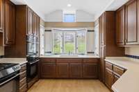 Triple bowed window, Corian counters, pull-out shelving in many cabinets