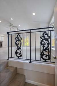 Herndon & Merry Iron Works created the wrought iron railing for the bonus room and the foyer.