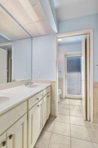 Owners' bath with double vanities