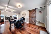 Adjoining dining room leading to the outdoor back deck or upstairs primary bedroom suite