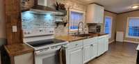 Beautiful, custom backsplash in big kitchen