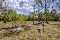 Well on Property with water management ditch  to direct water to the pond