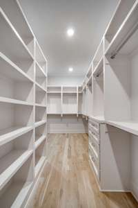 Walk-in closet with laundry.