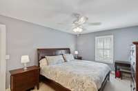 Primary Bedroom with Screened in private porch.