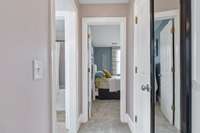 Upstairs Jack and Jill Bathroom with custom cabinets and marble tops