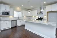 Look at all the cabinets in this Kitchen! Tons of storage. Picture is of a similar floor plan. Not actual home.