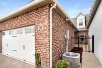 Two car garage attached to home.