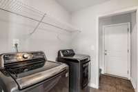 A separate room for the washer and dryer, not just a closet.