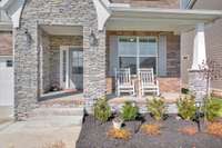 Relaxing in your Covered Porch with beautiful Stone Front