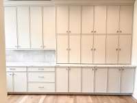 Tons of cabinets in the working pantry