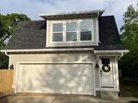 Detached two car garage with Carriage house apartment above.