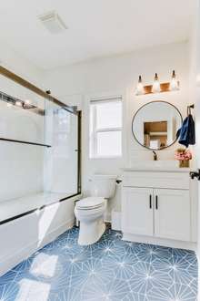 Main hallway bathroom! Love the tile accent!