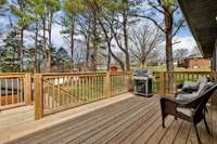 Spacious deck. Lots of space for entertainment and relaxation. Enjoy the peaceful sound of the whistling pines.