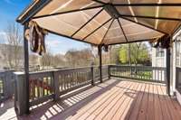 Enjoy family dinners on the covered deck which is right off the eat-in kitchen