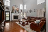 SECOND GREAT ROOM/DEN WITH FIREPLACE AND VAULTED CEILING