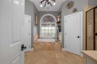 PRIMARY BATHROOM WITH TWO VANITIES, LARGE TUB AND SEPARATE TILE SHOWER