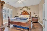 The master bedroom easily fits a king size bed and night stands. Tons of natural light throughout the home.