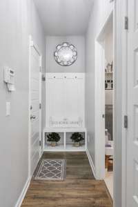 A mudroom bench positioned conveniently beside the garage door for easy entry.