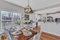 Breakfast area and the dining room are both near the kitchen.