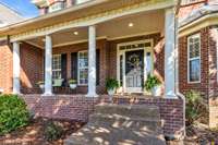 A welcoming front porch greets your guest and provides a place to rest and enjoy the neighborhood.