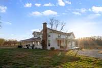 This fully-renovated 5,000 square foot historic farmhouse has exceptional views, comfort and functionality for a peaceful rural lifestyle.