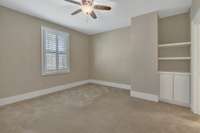 Bedroom 4 with Custom Built in and Walk In Closet with access to Full Bath 3