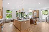 Custom White Oak Cabinetry in the kitchen, with paneled Jen-Air appliances