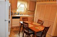 ANOTHER VIEW OF KITCHEN WITH WASHER & DRYER CLOSET