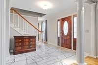 Lovely entry with original marble tile