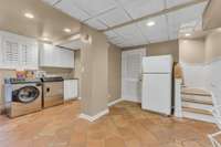 Finished basement with laundry room