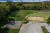 Common Area includes Basketball / Tennis / Pickleball and Two Sand Volleyball Courts!