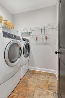 The Laundry Room is located right off of the Kitchen.